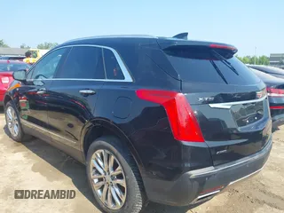 2017 Cadillac XT5 Platinum AWD with VIN 1GYKNFRS6HZ130626, listed as a IAAI auction lot 42470536 with 128,129 mi miles and . Bid and sale history available at DreamBid. Image 3.