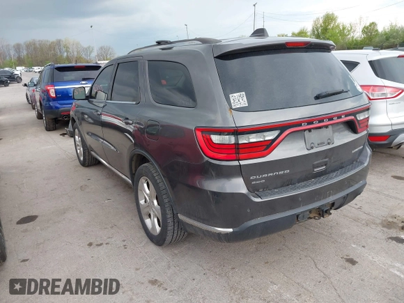 2014 Dodge Durango Limited z VIN 1C4RDJDG8EC597056, wystawiony jako IAAI lot #42116514 z przebiegiem 161 269 mil mil oraz . Historia ofert i sprzedaży dostępna na DreamBid. Obrazek 3.