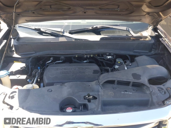 2012 Honda Pilot EX with VIN 5FNYF4H4XCB034825, listed as a IAAI auction lot 41974644 with 126,494 mi miles and . Bid and sale history available at DreamBid. Image 10.