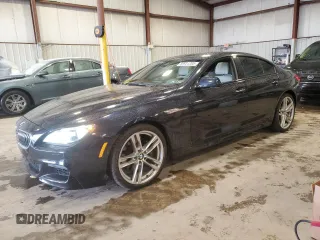 2015 BMW 6 Series 640i xDrive with VIN WBA6B8C58FD453159, listed as a Copart auction lot 88931285 with 145,656 mi miles and Salvage Title. Bid and sale history available at carsss.com. Image 1.