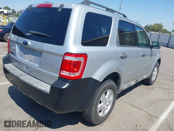 2011 Ford Escape XLT with VIN 1FMCU9D78BKC38601, listed as a IAAI auction lot 42784452 with 173,678 mi miles and . Bid and sale history available at DreamBid. Image 4.