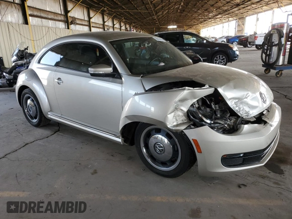 2012 Volkswagen Beetle 2.5L with VIN 3VWHX7AT5CM643314, listed as a Copart auction lot 58843455 with 72,448 mi miles and Salvage title. Bid and sale history available at DreamBid. Image 4.