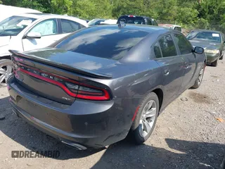 2018 Dodge Charger SXT Plus with VIN 2C3CDXHG9JH176400, listed as a IAAI auction lot 42128281 with 198,766 mi miles and . Bid and sale history available at carsss.com. Image 4.