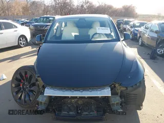 2022 Tesla Model Y Performance with VIN 7SAYGDEF0NF447541, listed as a IAAI auction lot 41762592 with 41,204 mi miles and . Bid and sale history available at DreamBid. Image 13.