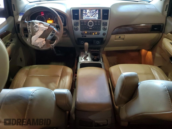 2014 Nissan Armada Platinum z VIN 5N1BA0NFXEN610416, wystawiony jako Copart lot #74033474 z przebiegiem 151 302 mil mil oraz Szkoda całkowita • Salvage title. Historia ofert i sprzedaży dostępna na DreamBid. Obrazek 8.