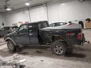 2003 Ford Ranger XL Fleet with VIN 1FTZR45EX3PA60520, listed as a IAAI auction lot 41591797 with 205,040 mi miles. Bid and sale history available at carsss.com. Image 14.