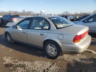 1999 Saturn SL z VIN 1G8ZK5270XZ212874, wystawiony jako Copart lot #85317464 z przebiegiem 153 477 mil mil oraz Szkoda całkowita • Salvage title. Historia ofert i sprzedaży dostępna na DreamBid. Obrazek 2.