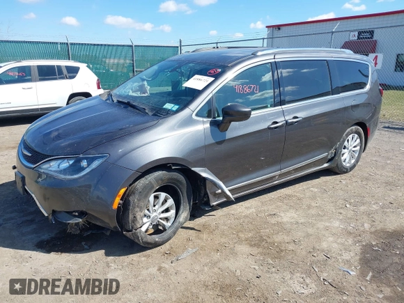 2018 Chrysler Pacifica Touring L with VIN 2C4RC1BGXJR356199, listed as a IAAI auction lot 41886721 with 111,514 mi miles and . Bid and sale history available at DreamBid. Image 2.