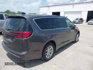 2023 Chrysler Pacifica Touring L with VIN 2C4RC1BG6PR590302, listed as a IAAI auction lot 42451369 with 72,097 mi miles and . Bid and sale history available at DreamBid. Image 4.