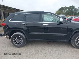 2021 Jeep Grand Cherokee Limited with VIN 1C4RJFBG8MC678548, listed as a IAAI auction lot 41912645 with 73,594 mi miles and . Bid and sale history available at DreamBid. Image 14.