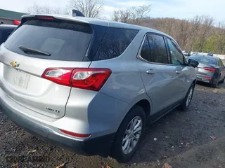 2018 Chevrolet Equinox LT with VIN 2GNAXSEV4J6336816, listed as a IAAI auction lot 41859776 with 112,239 mi miles. Bid and sale history available at carsss.com. Image 4.