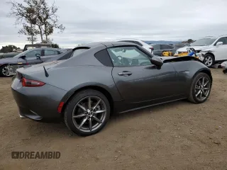 2022 Mazda MX-5 Miata Grand Touring z VIN JM1NDAM77N0501546, wystawiony jako Copart lot #82161264 z przebiegiem 12 245 mil mil oraz Szkoda całkowita • Salvage title. Historia ofert i sprzedaży dostępna na DreamBid. Obrazek 3.