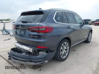2021 BMW X5 xDrive45e with VIN 5UXTA6C04M9D34382, listed as a IAAI auction lot 42080996 with 24,638 mi miles and . Bid and sale history available at DreamBid. Image 4.
