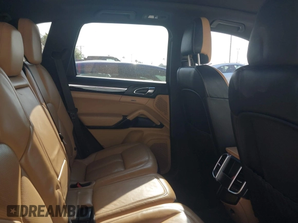 2016 Porsche Cayenne with VIN WP1AA2A21GKA15990, listed as a IAAI auction lot 41978980 with 141,738 mi miles. Bid and sale history available at carsss.com. Image 8.