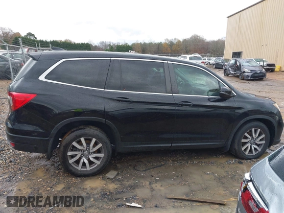 2019 Honda Pilot EX-L z VIN 5FNYF5H56KB016304, wystawiony jako IAAI lot #41072939 z przebiegiem 105 592 mil mil oraz . Historia ofert i sprzedaży dostępna na DreamBid. Obrazek 13.