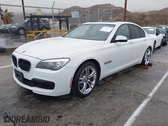 2013 BMW 7 Series 740i with VIN WBAYA6C57DC995338, listed as a IAAI auction lot 41479077 with 123,680 mi miles and . Bid and sale history available at DreamBid. Image 17.