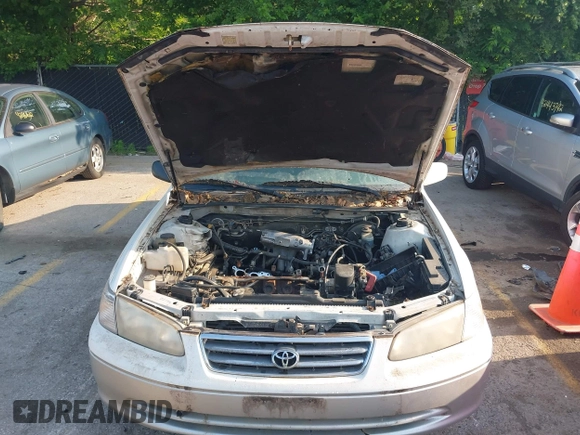 2001 Toyota Camry CE with VIN JT2BG22K010570556, listed as a IAAI auction lot 42458031 with 357,046 mi miles and . Bid and sale history available at DreamBid. Image 6.