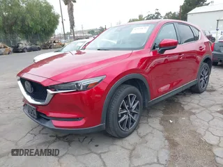 2018 Mazda CX-5 Grand Touring with VIN JM3KFADMXJ0302656, listed as a IAAI auction lot 42099173 with 125,378 mi miles and . Bid and sale history available at DreamBid. Image 18.