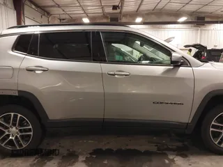 2019 Jeep Compass Latitude with VIN 3C4NJDBB6KT812711, listed as a IAAI auction lot 41565166 with 69,582 mi miles and . Bid and sale history available at carsss.com. Image 14.