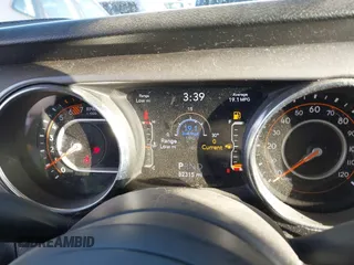 2021 Jeep Wrangler Unlimited Sport S z VIN 1C4HJXDN6MW597477, wystawiony jako IAAI lot #41089112 z przebiegiem 82 315 mil mil oraz . Historia ofert i sprzedaży dostępna na DreamBid. Obrazek 7.