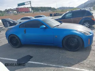 2007 Nissan 350Z Touring z VIN JN1BZ34E37M550112, wystawiony jako IAAI lot #41878280 z przebiegiem 87 374 mil mil oraz . Historia ofert i sprzedaży dostępna na DreamBid. Obrazek 13.