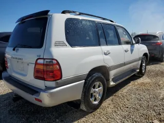 2001 Toyota Land Cruiser with VIN JTEHT05J912001418, listed as a Copart auction lot 81594494 with 289,258 mi miles and Salvage Title. Bid and sale history available at carsss.com. Image 3.