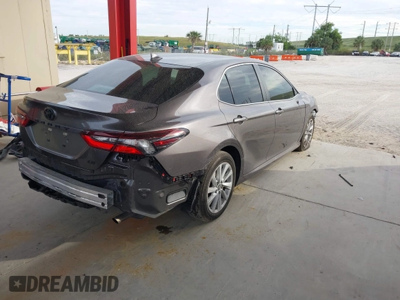 2023 Toyota Camry LE z VIN 4T1C11AK3PU719452, wystawiony jako IAAI lot #38236100 z przebiegiem 34 140 mil mil oraz . Historia ofert i sprzedaży dostępna na DreamBid. Obrazek 4.