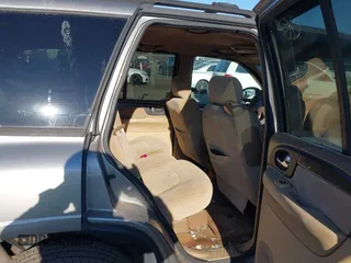 2002 GMC Envoy SLT with VIN 1GKDT13S822304832, listed as a IAAI auction lot 40874054 with 132,883 mi miles. Bid and sale history available at carsss.com. Image 8.