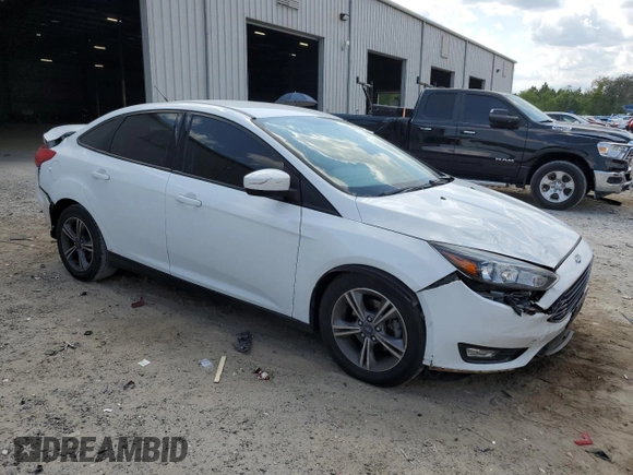 2018 Ford Focus SE with VIN 1FADP3FE5JL220077, listed as a Copart auction lot 52395795 with 87,785 mi miles and Salvage Title. Bid and sale history available at carsss.com. Image 4.