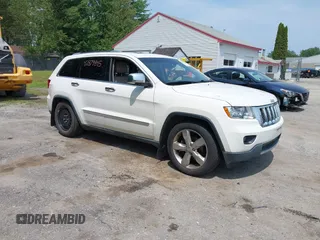 2011 Jeep Grand Cherokee Overland with VIN 1J4RR6GG3BC587857, listed as a IAAI auction lot 42879845 with 165,572 mi miles and . Bid and sale history available at DreamBid. Image 1.