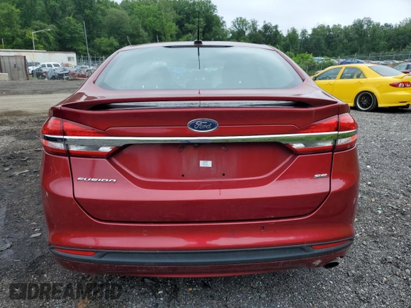2017 Ford Fusion SE with VIN 3FA6P0H74HR197800, listed as a Copart auction lot 61042735 with 128,125 mi miles and Salvage title. Bid and sale history available at DreamBid. Image 6.