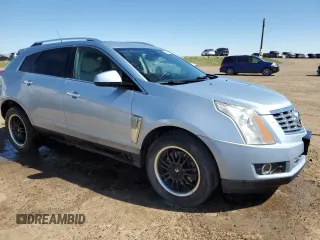 2013 Cadillac SRX Premium Collection with VIN 3GYFNJE31DS555908, listed as a Copart auction lot 58870495 with 170,880 mi miles and Clean title. Bid and sale history available at DreamBid. Image 4.