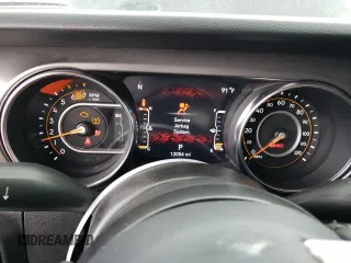 2023 Jeep Wrangler Sport with VIN 1C4HJXDN9PW638737, listed as a Copart auction lot 71367284 with 12,054 mi miles and Salvage Title. Bid and sale history available at DreamBid. Image 9.