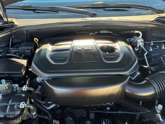 2018 Dodge Durango SXT with VIN 1C4RDJAG0JC111239, listed as a Copart auction lot 56432955 with 146,497 mi miles and Clean Title. Bid and sale history available at DreamBid. Image 7.