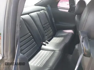 2003 Ford Mustang GT Deluxe z VIN 1FAFP42X43F394679, wystawiony jako IAAI lot #42129223 z przebiegiem 135 472 mil mil oraz . Historia ofert i sprzedaży dostępna na DreamBid. Obrazek 8.
