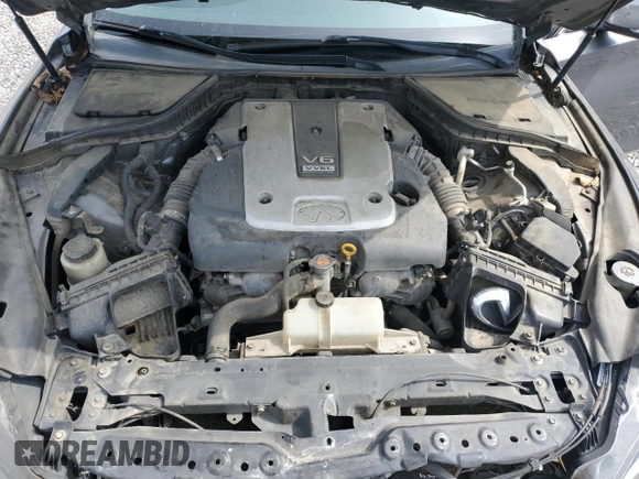 2015 Infiniti Q50 z VIN JN1BV7AR4FM393747, wystawiony jako Copart lot #59735735 z przebiegiem 234 354 mil mil oraz Szkoda całkowita • Salvage title. Historia ofert i sprzedaży dostępna na DreamBid. Obrazek 11.