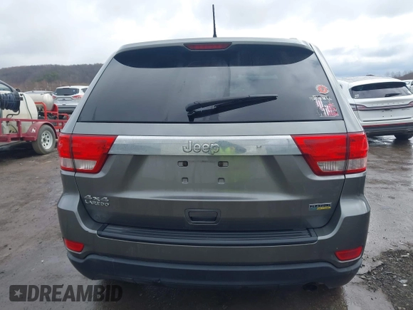 2012 Jeep Grand Cherokee Laredo with VIN 1C4RJFAGXCC118823, listed as a IAAI auction lot 41808398 with 153,509 mi miles. Bid and sale history available at carsss.com. Image 16.