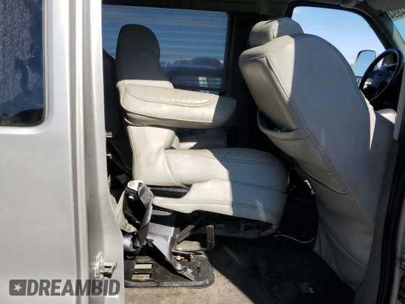 2006 GMC Savana z VIN 1GDGG29U661252944, wystawiony jako Copart lot #76284894 z przebiegiem 192 410 mil mil oraz Szkoda całkowita • Salvage title. Historia ofert i sprzedaży dostępna na DreamBid. Obrazek 11.