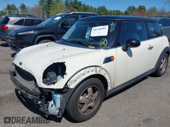 2008 MINI Hardtop with VIN WMWMF33598TU66736, listed as a IAAI auction lot 42118994 with 136,569 mi miles and . Bid and sale history available at DreamBid. Image 2.