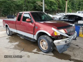 2000 Ford F-150 XL z VIN 1FTRX18LXYNB45648, wystawiony jako Copart lot #60152425 z przebiegiem 92 774 mil mil oraz Szkoda całkowita • Salvage title. Historia ofert i sprzedaży dostępna na DreamBid. Obrazek 4.