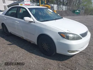 2003 Toyota Camry LE with VIN JTDBE32K830222476, listed as a IAAI auction lot 42160720 with 161,570 mi miles and . Bid and sale history available at DreamBid. Image 1.
