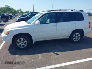 2006 Toyota Highlander with VIN JTEGD21A860141215, listed as a IAAI auction lot 42571223 with Not provided miles and . Bid and sale history available at DreamBid. Image 2.