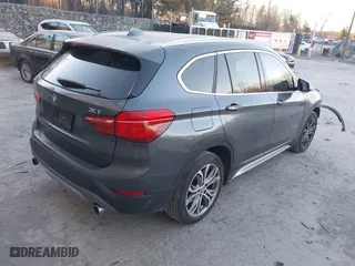 2017 BMW X1 xDrive28i with VIN WBXHT3C33H5F87591, listed as a IAAI auction lot 41256899 with 69,362 mi miles. Bid and sale history available at carsss.com. Image 4.
