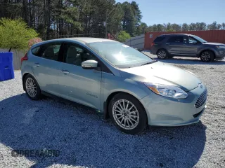 2014 Ford Focus Electric with VIN 1FADP3R40EL259832, listed as a Copart auction lot 49326015 with 58,774 mi miles and Clean title. Bid and sale history available at DreamBid. Image 4.
