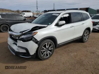2021 Honda Pilot Touring 8-Passenger with VIN 5FNYF6H94MB047188, listed as a Copart auction lot 50156745 with 56,322 mi miles and Salvage title. Bid and sale history available at DreamBid. Image 1.