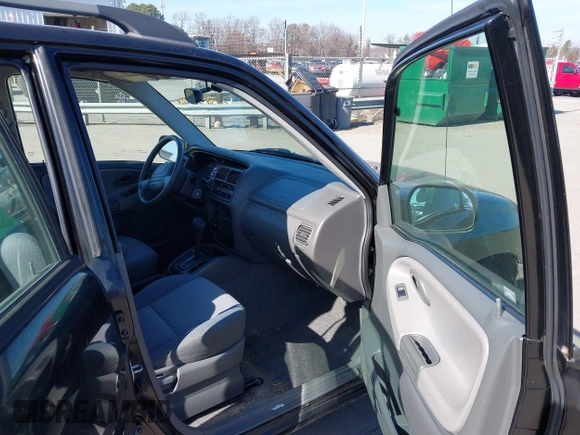 2003 Chevrolet Tracker with VIN 2CNBE13C736921273, listed as a IAAI auction lot 41453815 with 150,768 mi miles and . Bid and sale history available at DreamBid. Image 5.