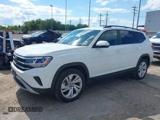 2021 Volkswagen Atlas SE z VIN 1V2WR2CA9MC585700, wystawiony jako IAAI lot #42234502 z przebiegiem 46 040 mil mil oraz . Historia ofert i sprzedaży dostępna na DreamBid. Obrazek 2.