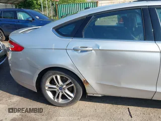 2016 Ford Fusion SE Hybrid z VIN 3FA6P0LU6GR121605, wystawiony jako IAAI lot #42651096 z przebiegiem 194 693 mil mil oraz . Historia ofert i sprzedaży dostępna na DreamBid. Obrazek 12.