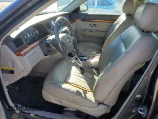 2006 Kia Amanti z VIN KNALD124165086600, wystawiony jako Copart lot #79354294 z przebiegiem 110 537 mil mil oraz Tytuł czysty. Historia ofert i sprzedaży dostępna na DreamBid. Obrazek 7.