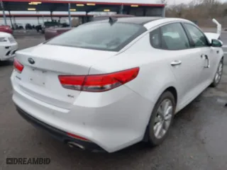 2016 Kia Optima EX with VIN 5XXGU4L30GG120518, listed as a IAAI auction lot 41602190 with 116,268 mi miles. Bid and sale history available at carsss.com. Image 4.